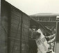 Paris, France.  Crate of items looted during Möbel-Aktion being loaded directly onto a rail car under German supervision.